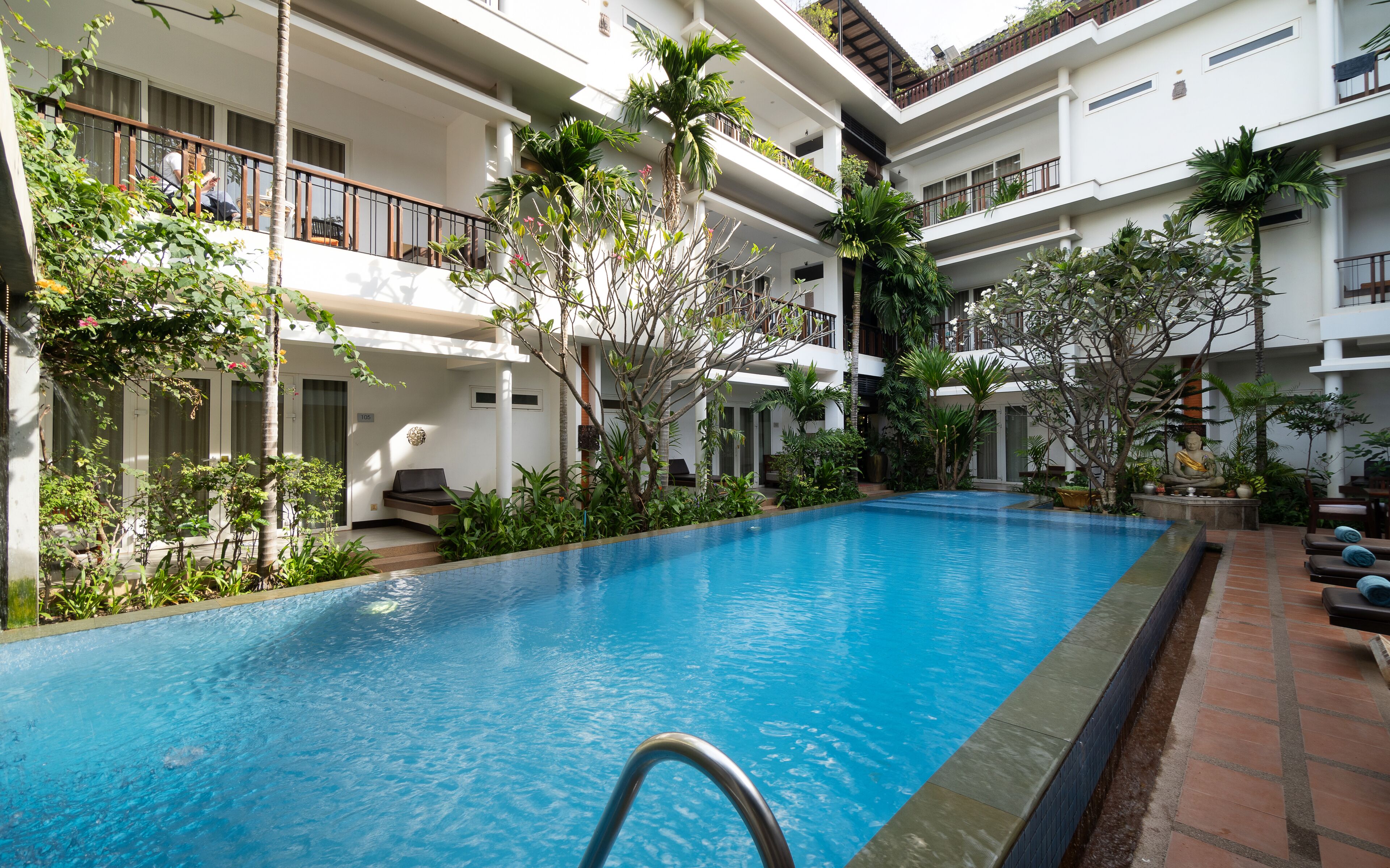 Outdoor pool, open 9:00 AM to 9:00 PM, pool umbrellas, sun loungers