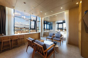 Designers Suite B (Premier Pool Namsan View Suite) | Living area | 50-inch LED TV with cable channels, TV, Netflix