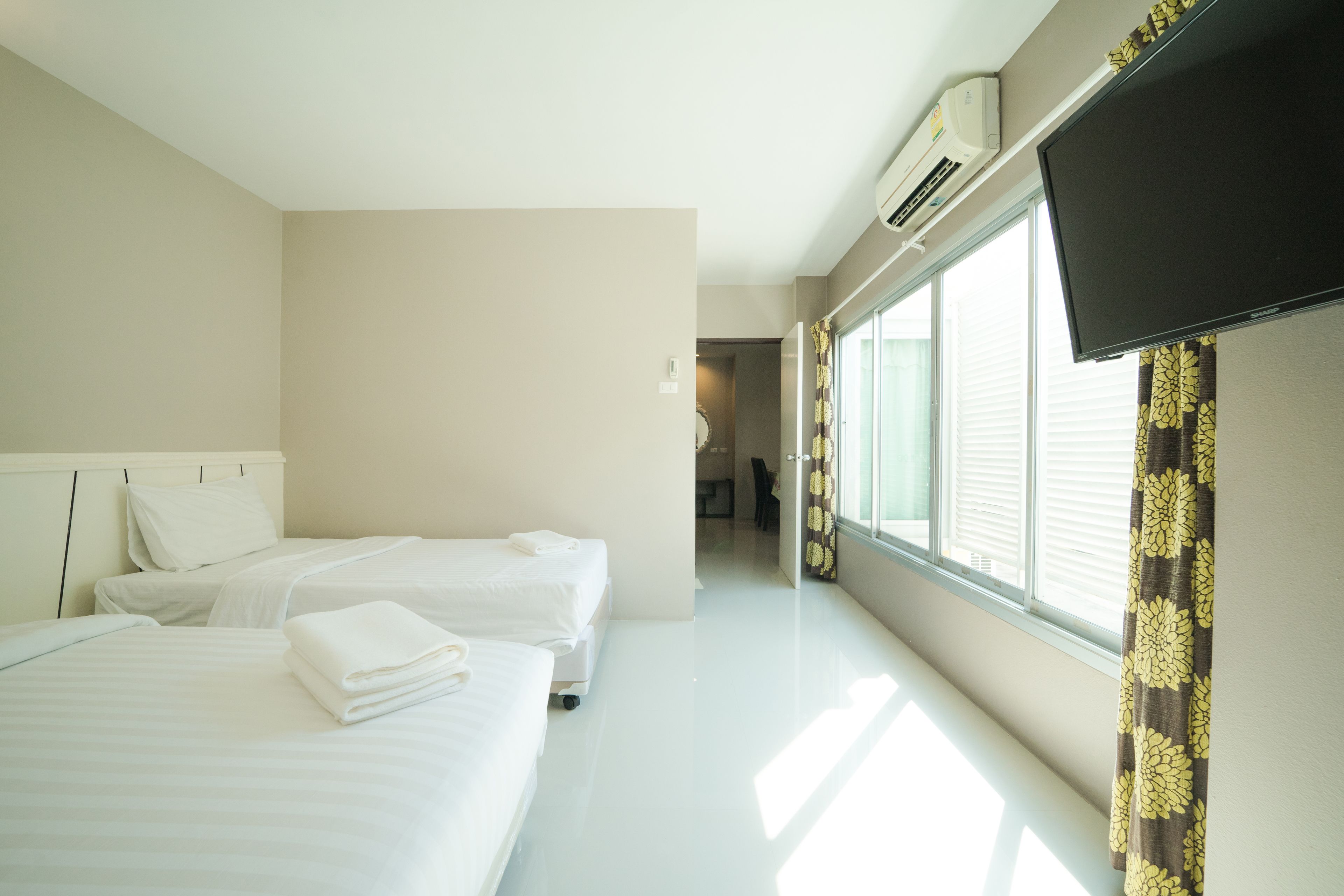 Suite 1 Bedroom | Blackout curtains, rollaway beds, free WiFi, bed sheets
