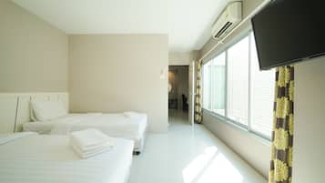 Suite 1 Bedroom | Blackout curtains, rollaway beds, free WiFi, bed sheets