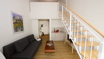 Classic Studio, 1 Bedroom | Living area | Flat-screen TV