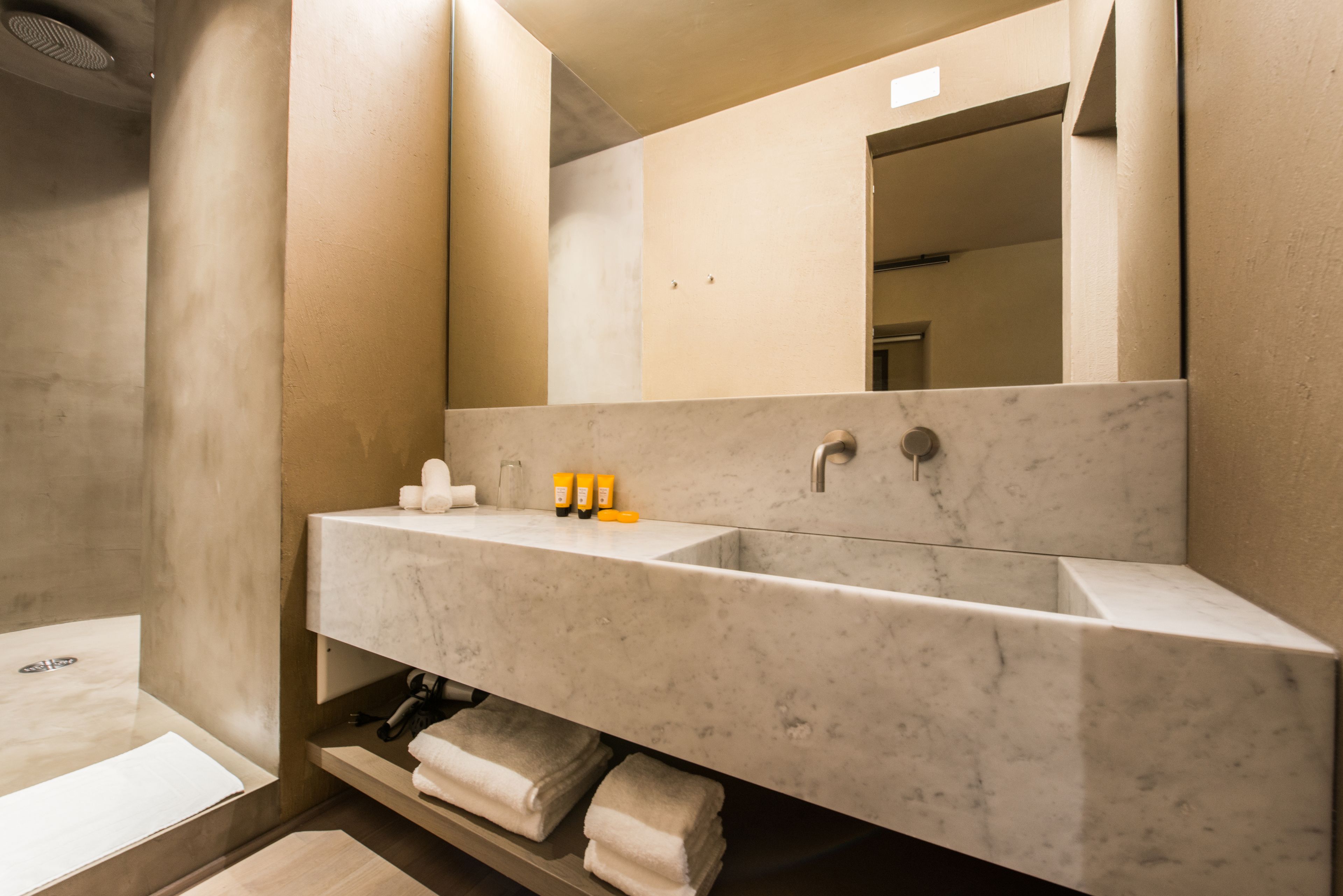 shower, free toiletries, slippers, bidet