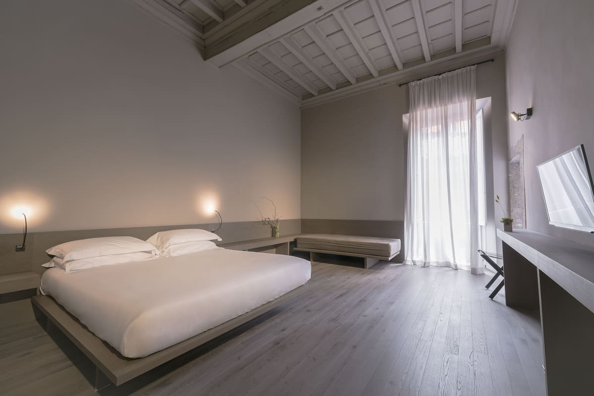Deluxe Suite, 2 Bedrooms | Premium bedding, in-room safe, desk, soundproofing