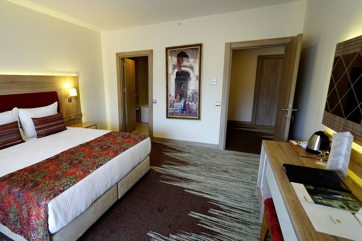 Family Suite, Balcony | Minibar, in-room safe, desk, rollaway beds