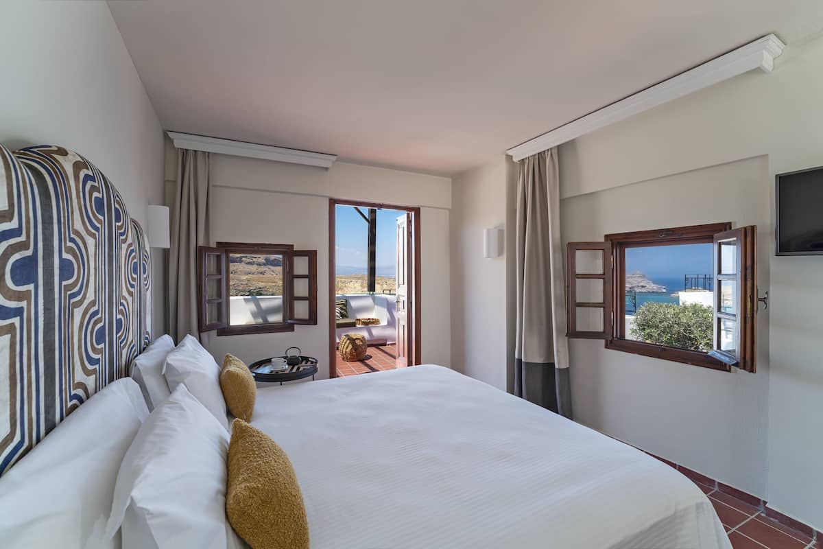 Honeymoon studio suite, 1 queensize bed, balkon, uitzicht op zee (private terrace) | 1 slaapkamer, een kluis op de kamer, verduisterende gordijnen
