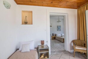 Family Apartment, 1 Bedroom, Sea View | Living area | Plasma TV
