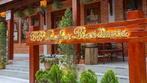 A wooden sign with the text "BB King Residence" illuminated. - BB Angkor Residence (Siem Reap)