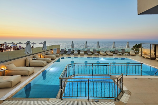 Seasonal outdoor pool, pool umbrellas, sun loungers