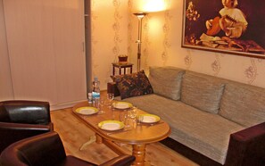 Appartement Premium, 3 chambres | Coin séjour | Télévision à écran plat