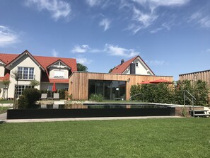 Seasonal outdoor pool, pool umbrellas, sun loungers