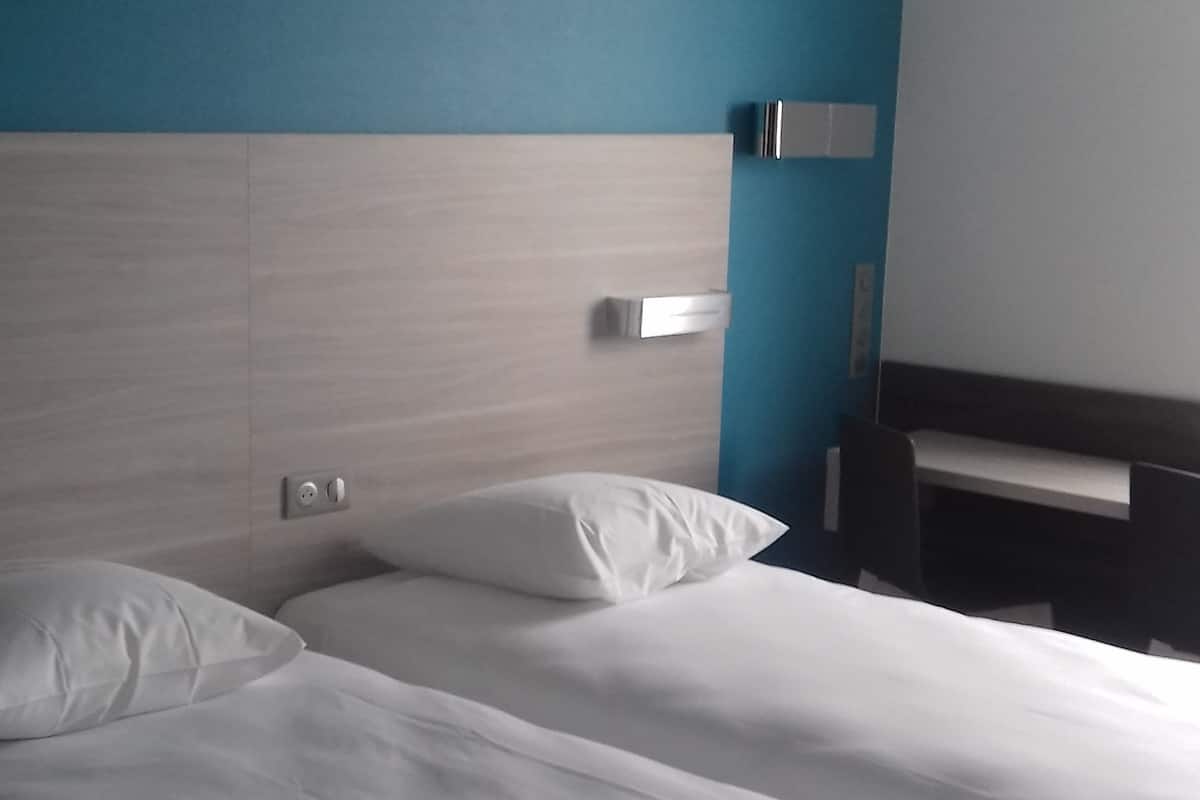 twin room | desk, blackout curtains, soundproofing, iron/ironing board