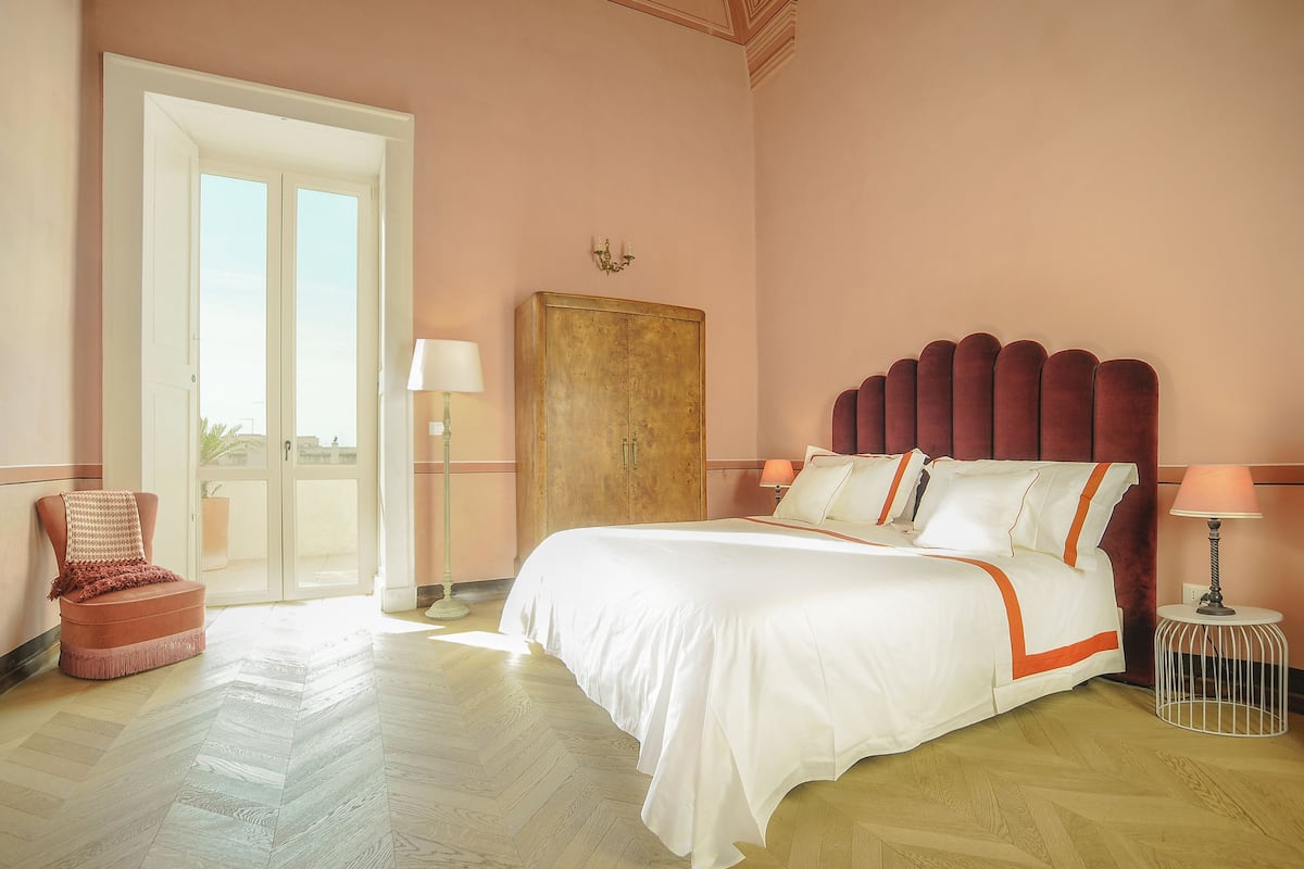 Deluxe Suite, Terrace | 1 bedroom, down comforters, minibar, free WiFi