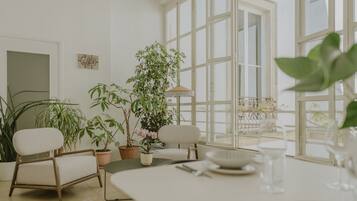 Deluxe Apartment | Living area | TV