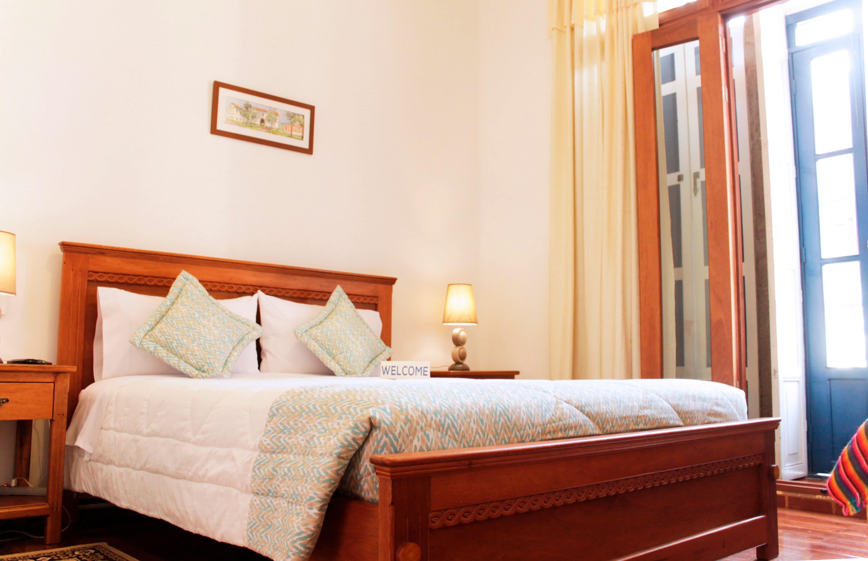 comfort double room, 1 king bed, private bathroom, city view | in-room safe, soundproofing, free wifi, bed sheets