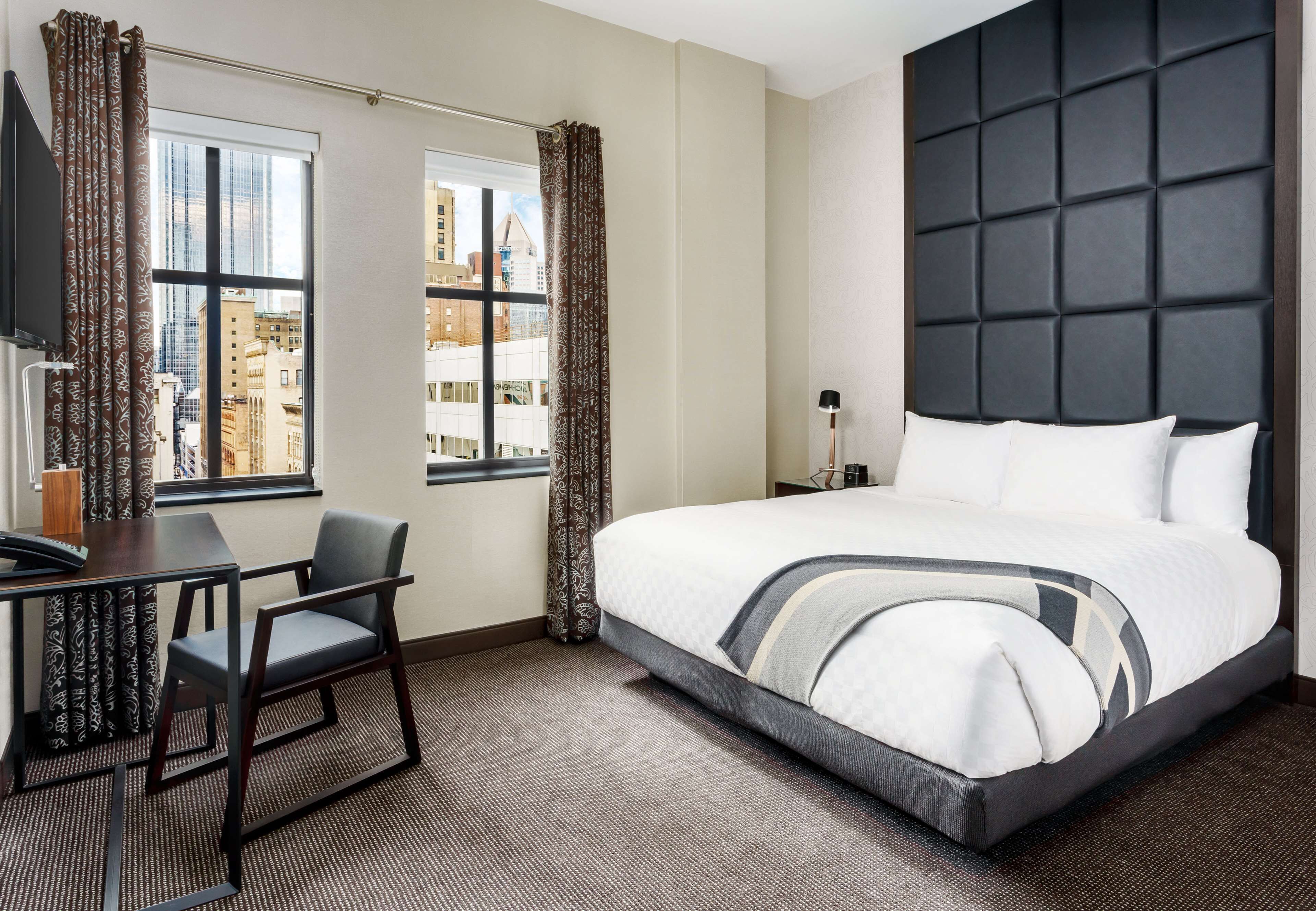 Premium bedding, pillow-top beds, in-room safe, individually decorated