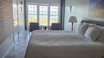 Standard Room, 1 King Bed, Partial Ocean View | Soundproofing, iron/ironing board, free WiFi, bed sheets