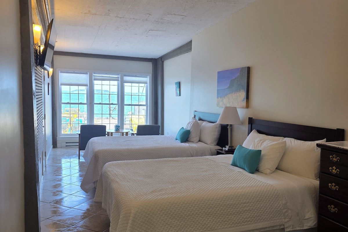 Standard Double Room, 2 Queen Beds, Partial Ocean View | Soundproofing, iron/ironing board, free WiFi, bed sheets