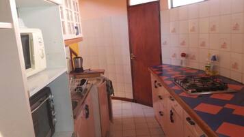 Rumah Keluarga, 4 kamar tidur | Dapur pribadi | Lemari es besar, microwave, oven, dan kompor