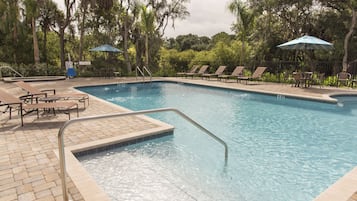 Outdoor pool, pool umbrellas, sun loungers