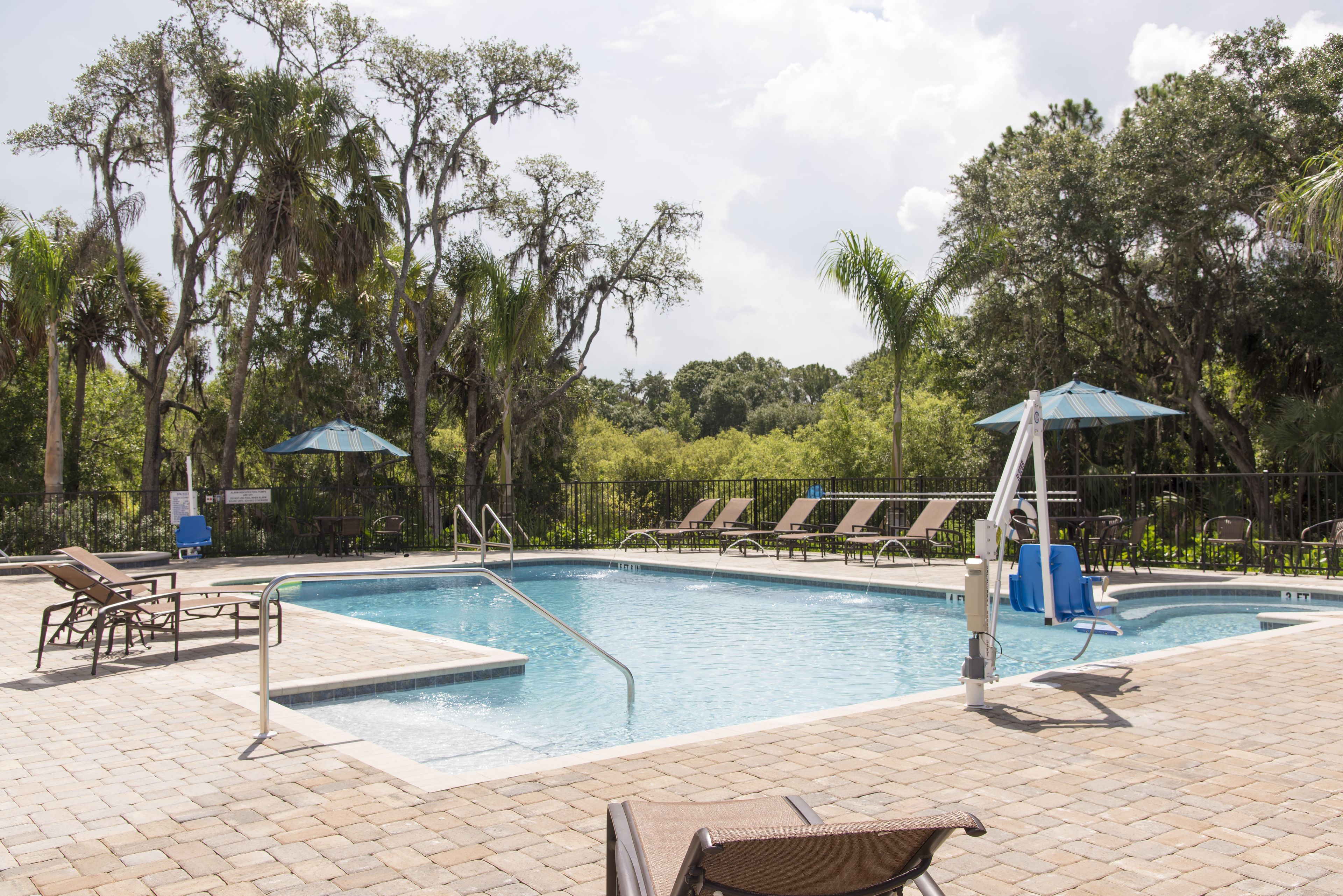 outdoor pool, pool umbrellas, pool loungers