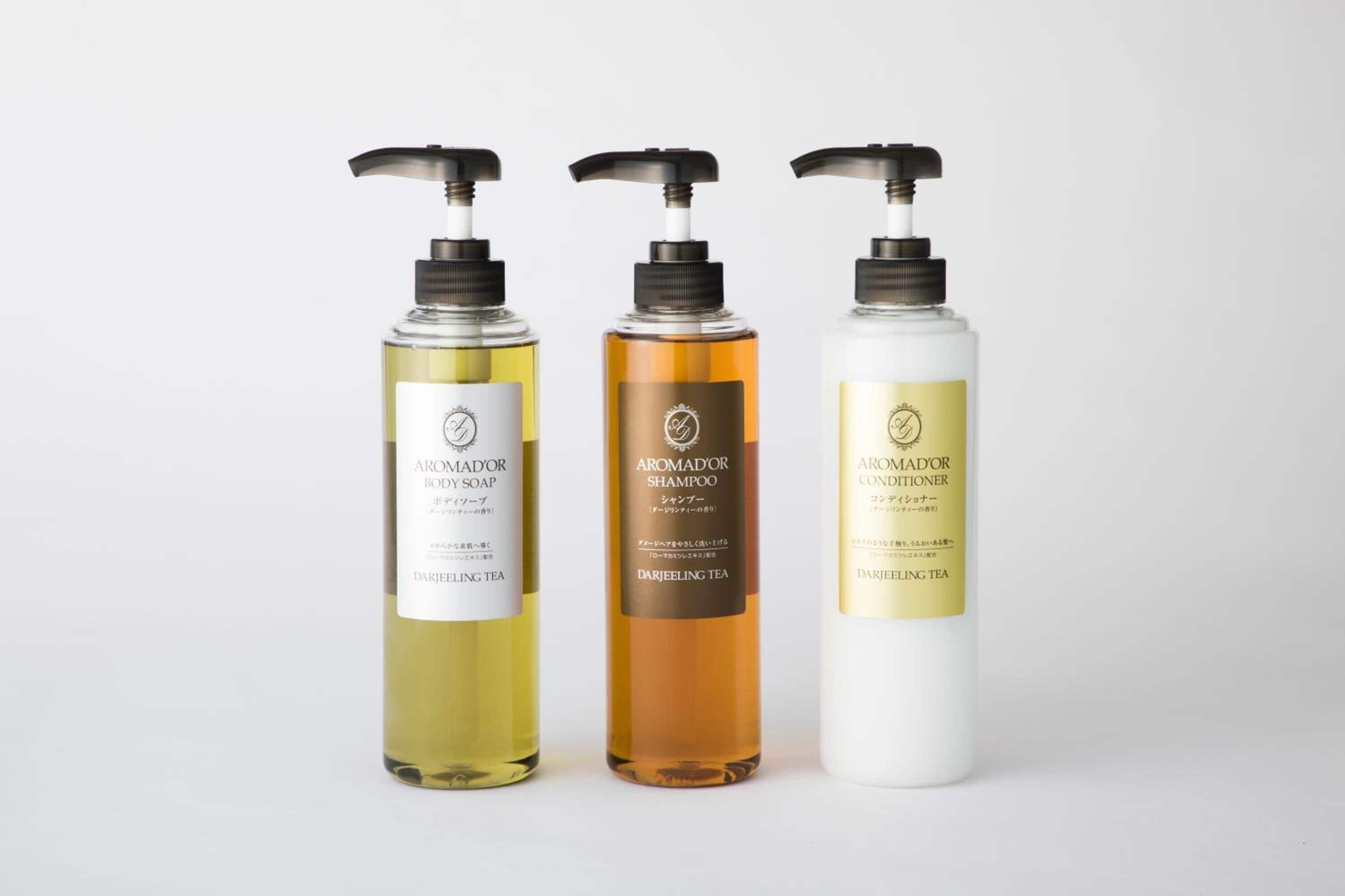 shower, hair dryer, slippers, towels