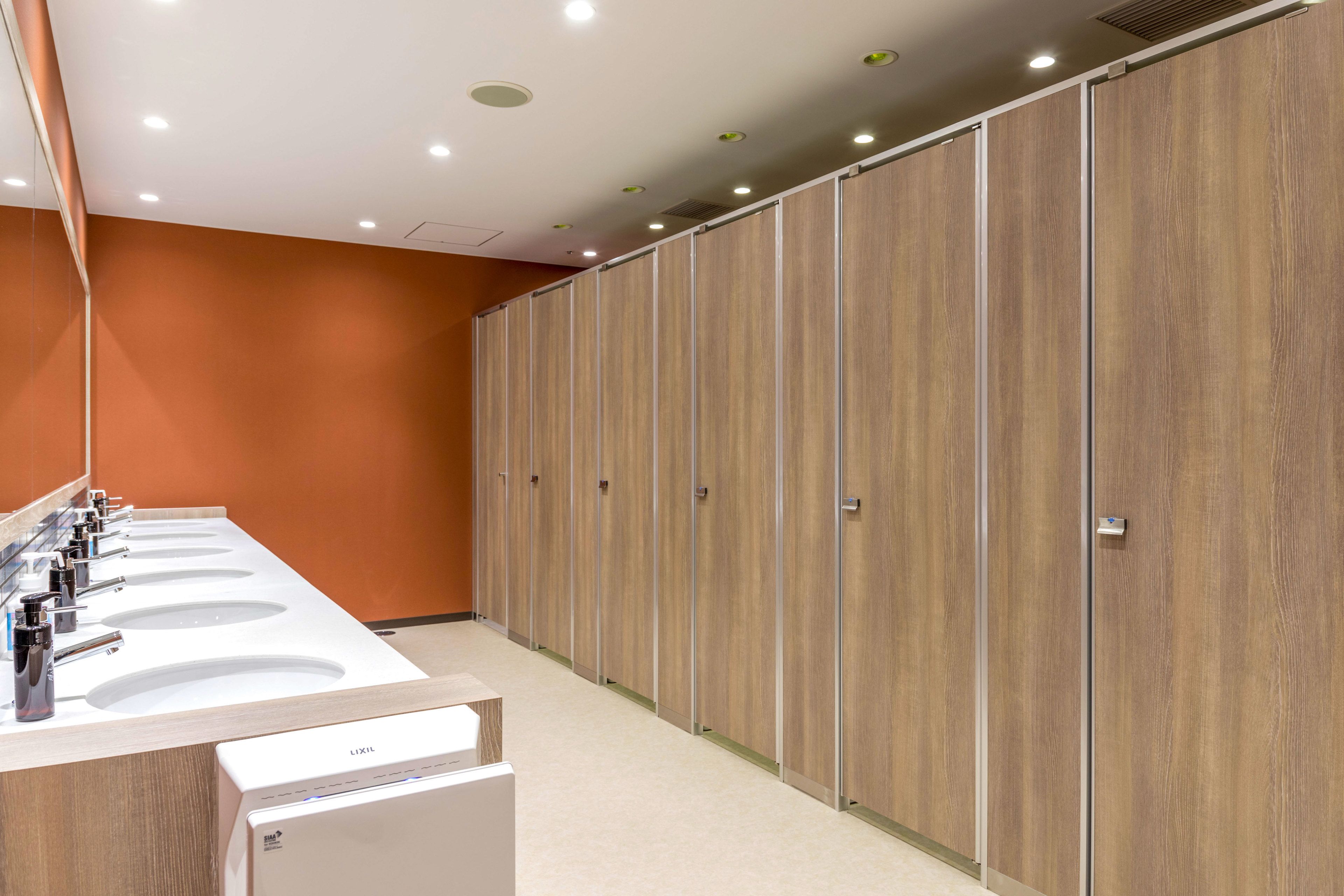 shower, hair dryer, slippers, towels