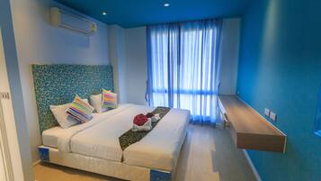 Premium bedding, blackout curtains, iron/ironing board, free WiFi