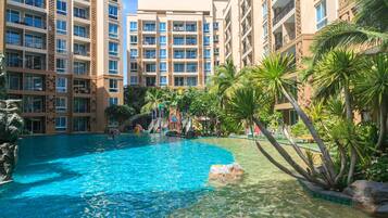 Outdoor pool, pool umbrellas, pool loungers