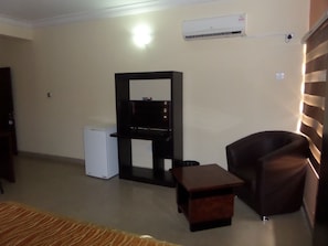 Chambre Exécutive, 1 très grand lit | Équipements de la chambre