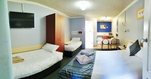 Familienstudio, Mehrere Betten | Hochwertige Bettwaren, Zimmersafe, Schreibtisch