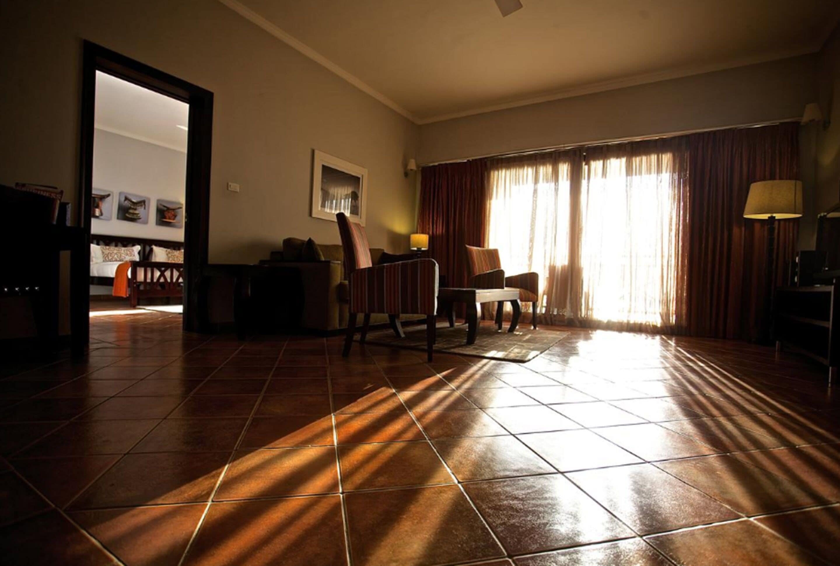 presidential suite, 2 bedrooms, lake view | living room | lcd tv