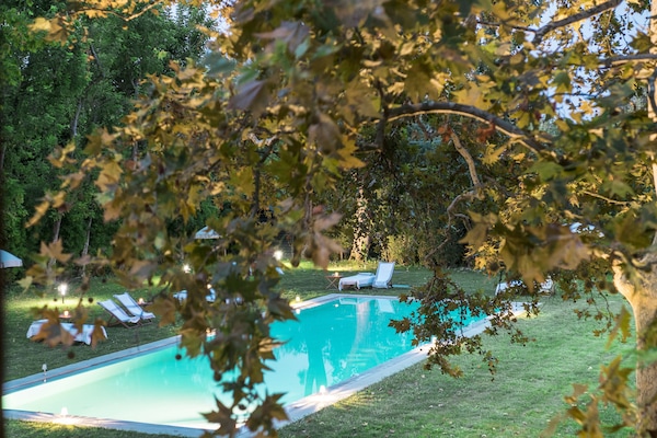 Seasonal outdoor pool, open 8:00 AM to 8:00 PM, pool umbrellas