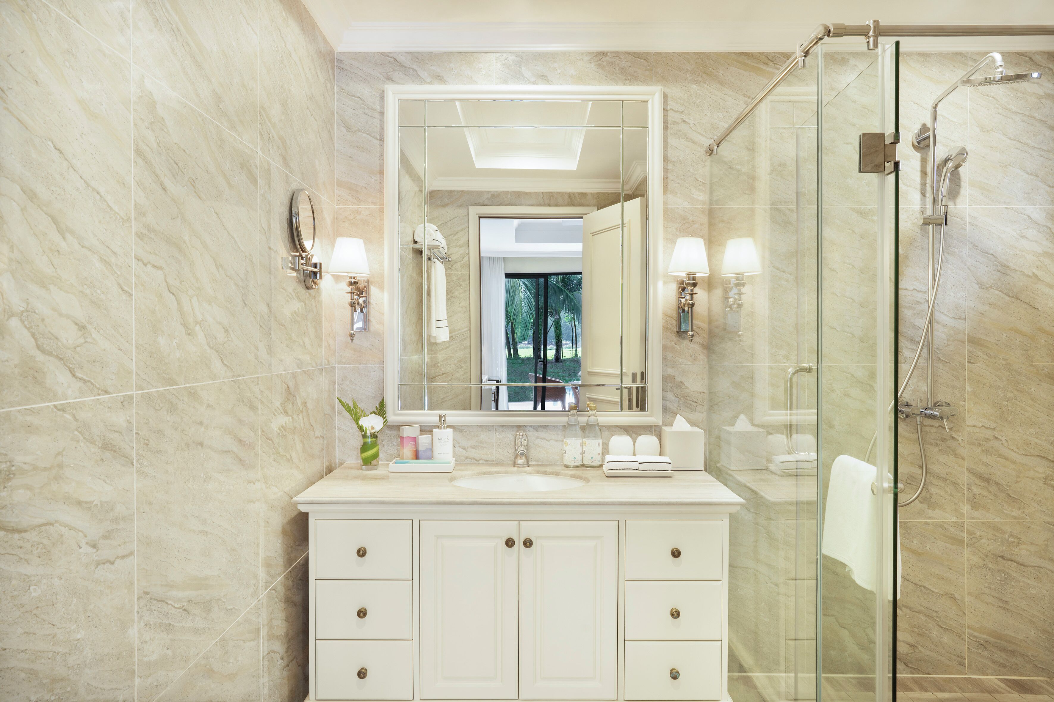 separate bathtub and shower, designer toiletries, hair dryer, slippers