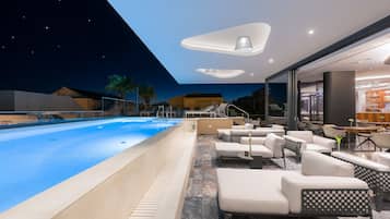 Outdoor pool, pool umbrellas, pool loungers