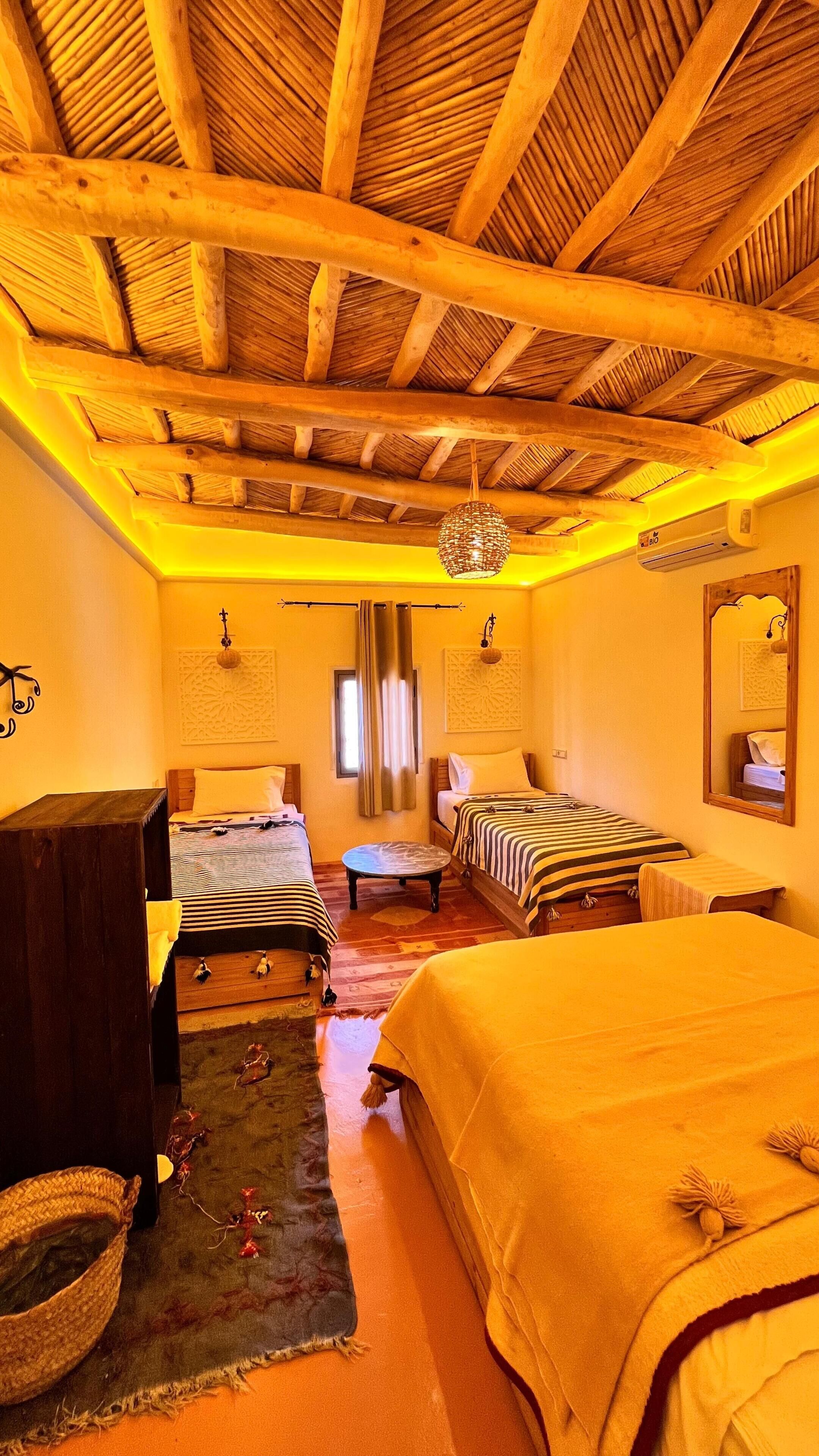 Chambre triple Confort | Draps italiens de Frette, literie de qualité