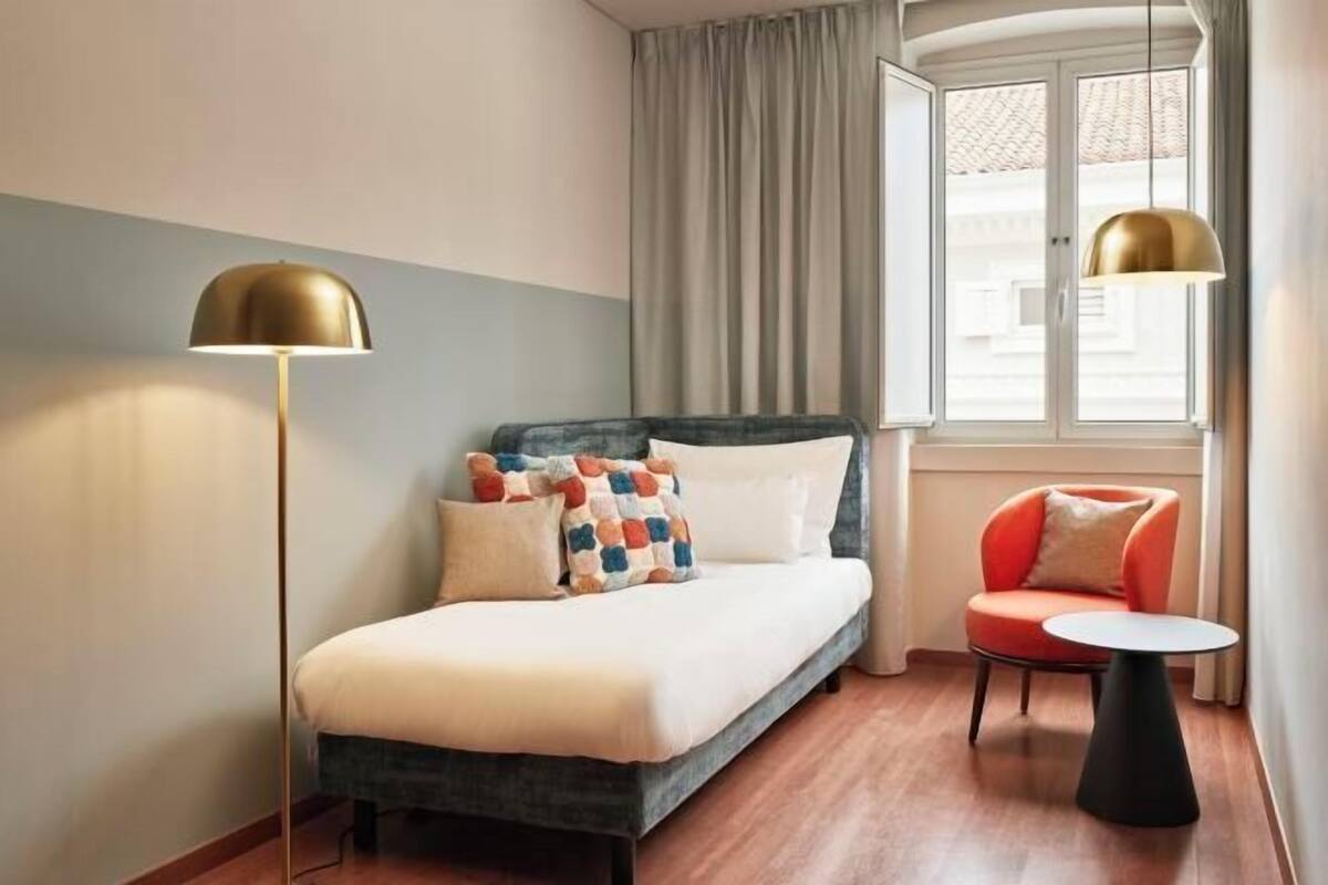 Blackout drapes, iron/ironing board, WiFi (free), bed sheets