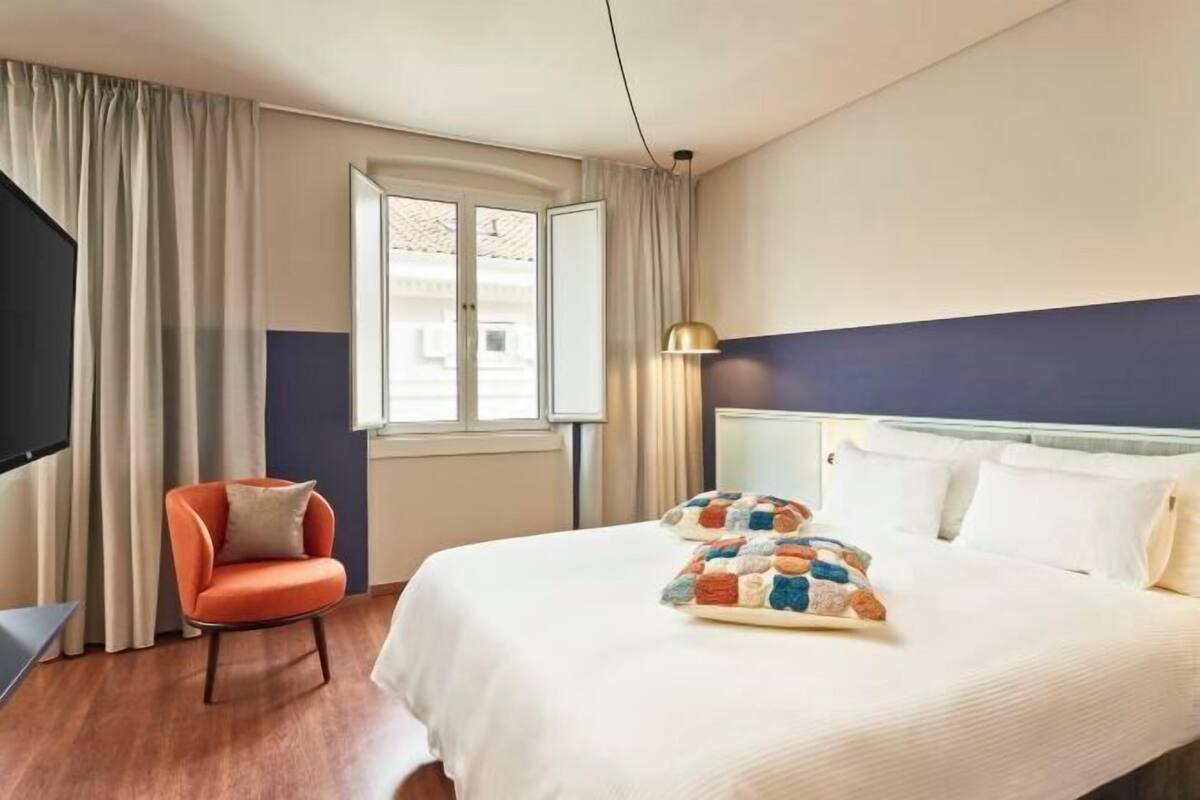 Blackout drapes, iron/ironing board, WiFi (free), bed sheets