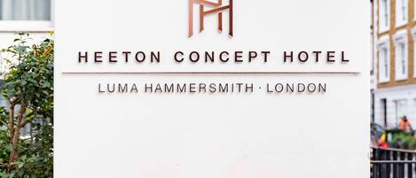 A sign for the Heeton Concept Hotel in Luma Hammersmith, London.