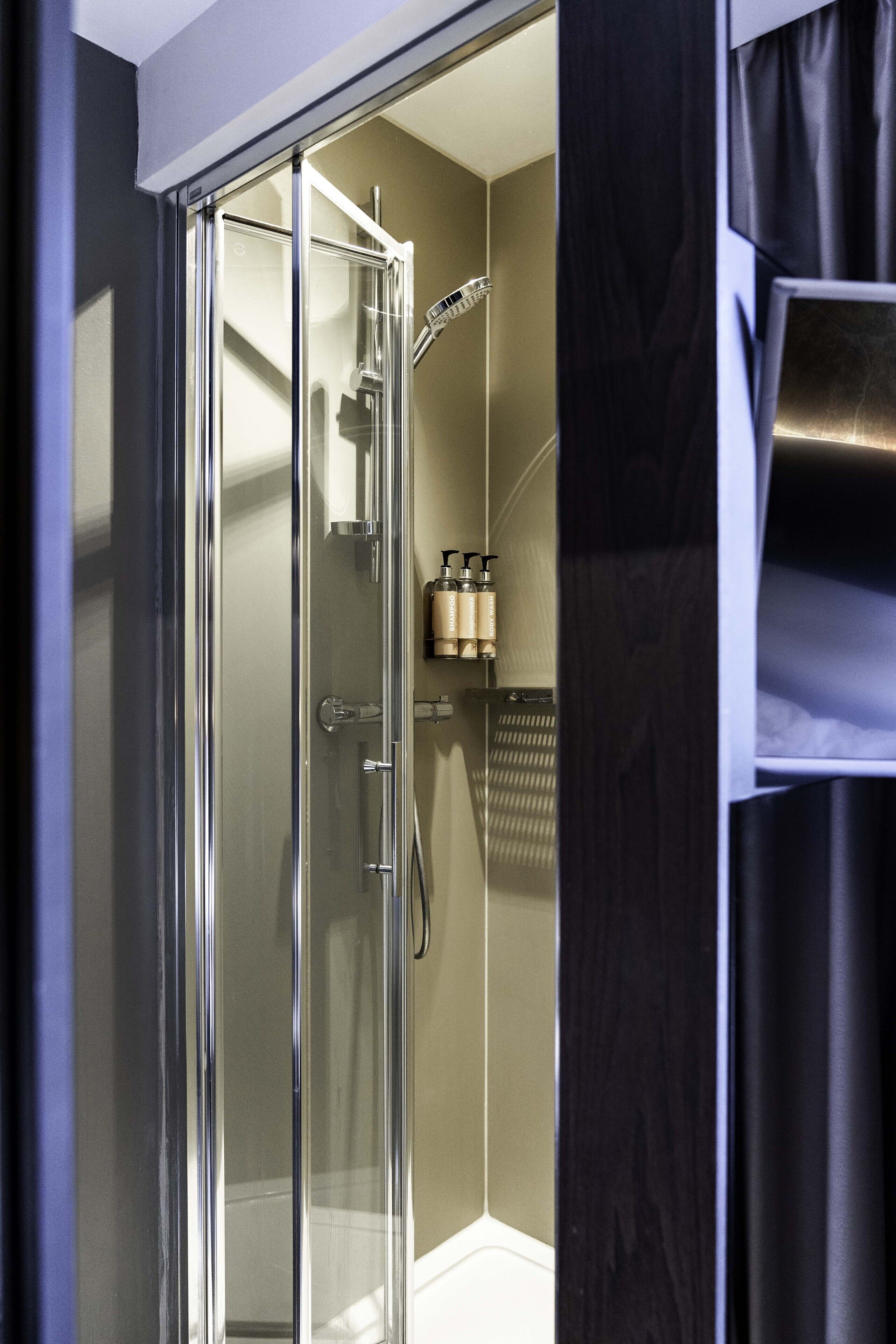 shower, free toiletries, hair dryer, towels