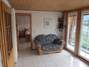 Panoramic Apartment, 2 Bedrooms, Balcony, River View | Living room | Flat-screen TV, DVD player