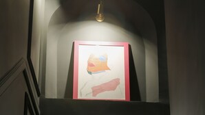 A staircase with a framed picture at the top. - Saint B Boutique Hotel STB (Rome)
