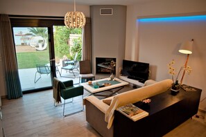 Studio, Sea View, Ground Floor (Euphoria) | Living area | 40-inch flat-screen TV with satellite channels, TV, DVD player - Seacret Apartments (Aigialeia)