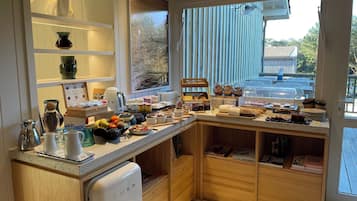 Daily buffet breakfast (EUR 25 per person)