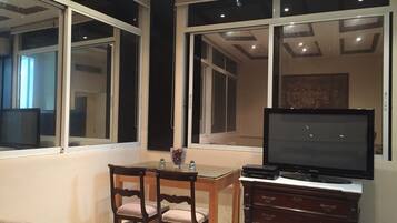 Royal Suite | Living area | 30-inch LCD TV with satellite channels, TV, DVD player