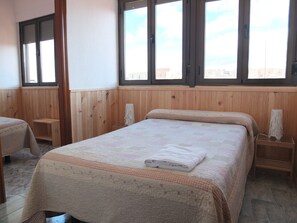 Habitación triple Confort, baño privado | Wifi gratis