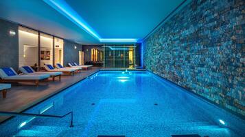 Indoor pool, outdoor pool, pool umbrellas, pool loungers