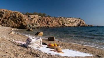 Na praia, toalhas de praia