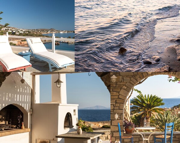 A coastal hotel with lounge chairs, a barbecue area, and a view of the sea. - Martineli Residence (Paros)