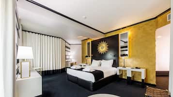 Suite superior | 1 habitación, minibar, caja de seguridad en la habitación y escritorio