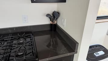 Deluxe Cabin | Private kitchen | Full-size fridge, microwave, stovetop, coffee/tea maker